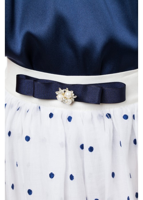 Costume skirt made of milk batiste with blue bows and a shirt made of blue silk
